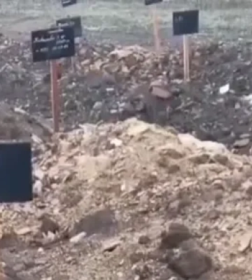 Видео: Под Донецком оккупантов хоронят на заброшенном кладбище среди мусора