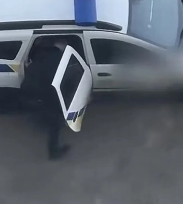 Силовое задержание в Киеве: на глазах у маленькой дочери мужчину силой затолкали в полицейское авто. ВИДЕО