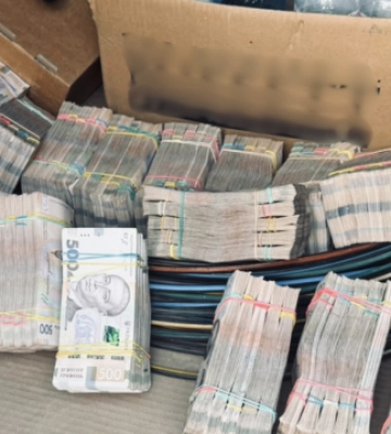 Фіктивні компанії, мільйони готівки та віртуальні активи: масштабний конвертаційний центр викрили на Київщині