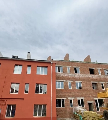 Відновлення будинку на вулиці Ахієзерів у Харкові: ремонт даху та фасаду