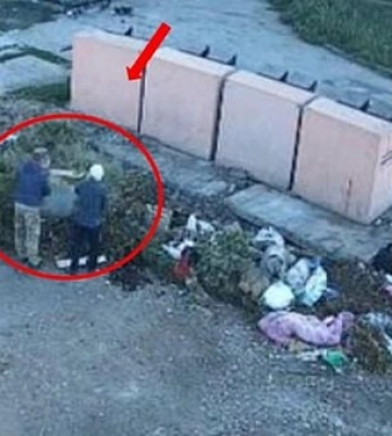 У Кривому Розі камери зафіксували людей, які залишили сміття біля контейнерів